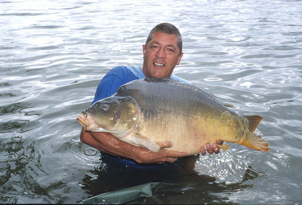 Ken Townley holding large catch.