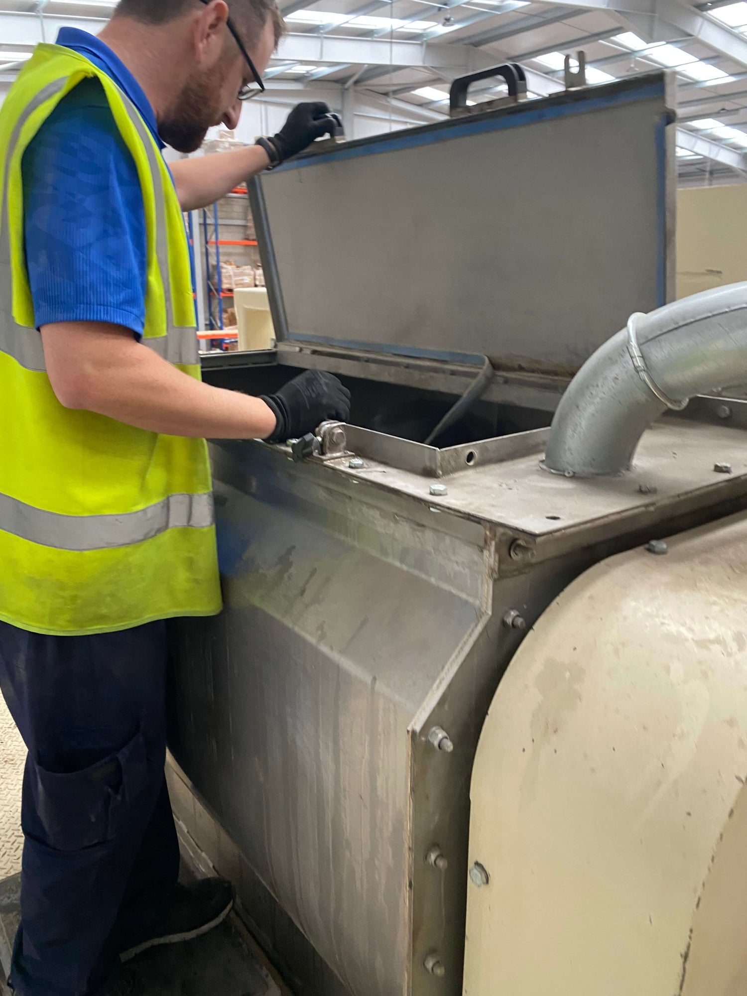 One of Haith's bird seeds experts cleaning seed 